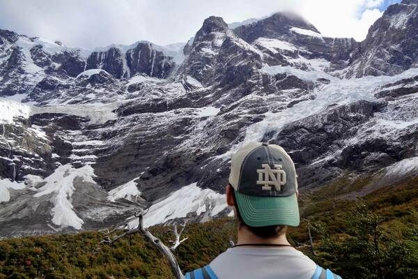Student looks out at mountains